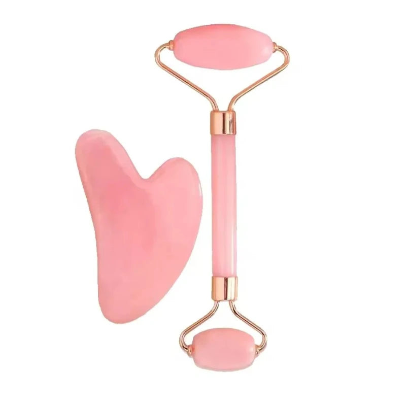 Gua sha en jade roller voor lymfedrainage in het gezicht